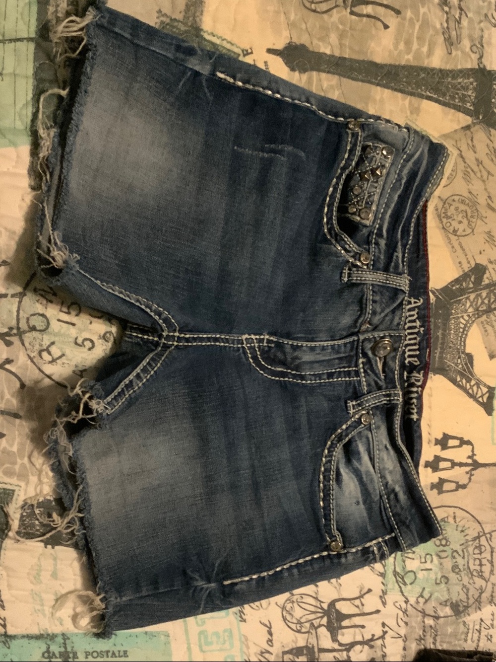 Antique Rivet Medium Blue Frayed Hem Denim Shorts